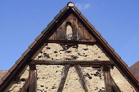 The adobe house needs maintenance. But even without it, the adobe structure will live for decades