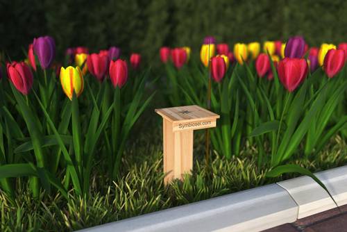 Garden sensor in a decorative housing made from natural materials